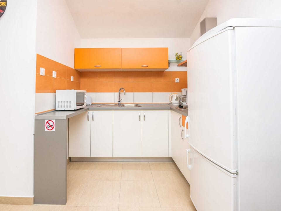 House (Four Bedroom Holiday Home with Swimmi) | Private kitchen | Fridge
