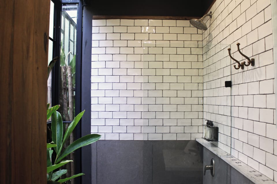 Room 2 shower overlooking the bar | Bathroom | Shower, free toiletries, bidet, towels