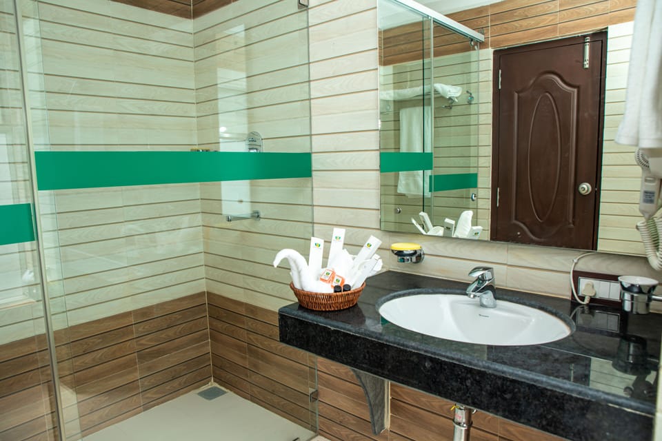 Rainfall showerhead, free toiletries, hair dryer, slippers