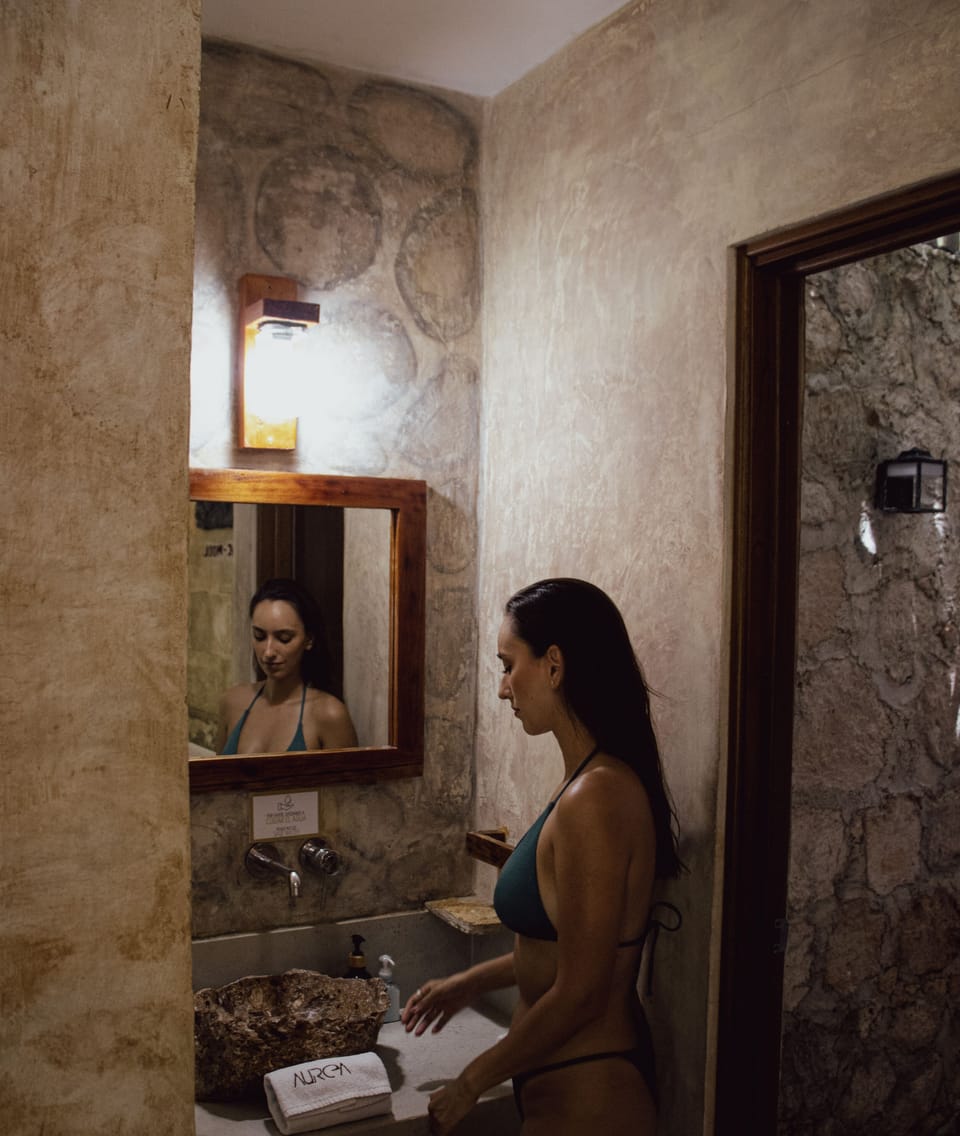 Shower, rainfall showerhead, towels, soap