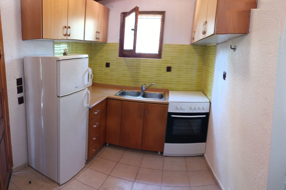 Villa | Private kitchen | Fridge, microwave, oven, coffee/tea maker