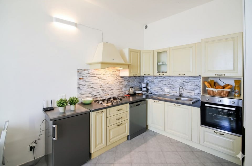Apartment | Private kitchen | Fridge, oven, stovetop, dishwasher