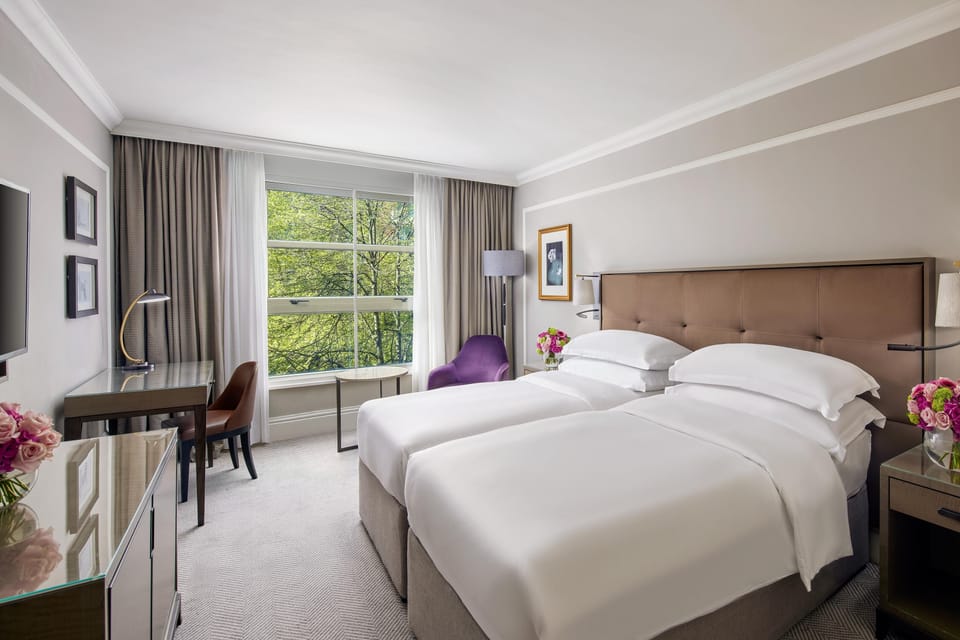 Hypo-allergenic bedding available, minibar, in-room safe