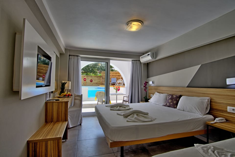 Double or Twin Room, Private Pool (Swim Up) | Individually decorated, desk, laptop workspace, iron/ironing board