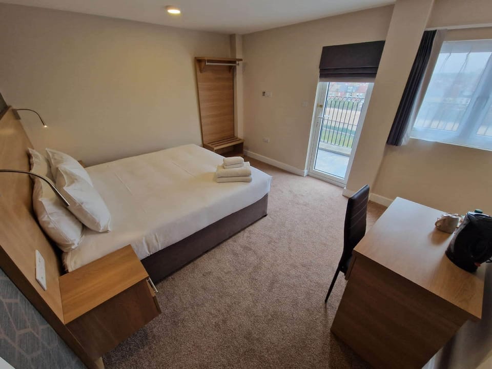 Desk, blackout drapes, iron/ironing board, free WiFi