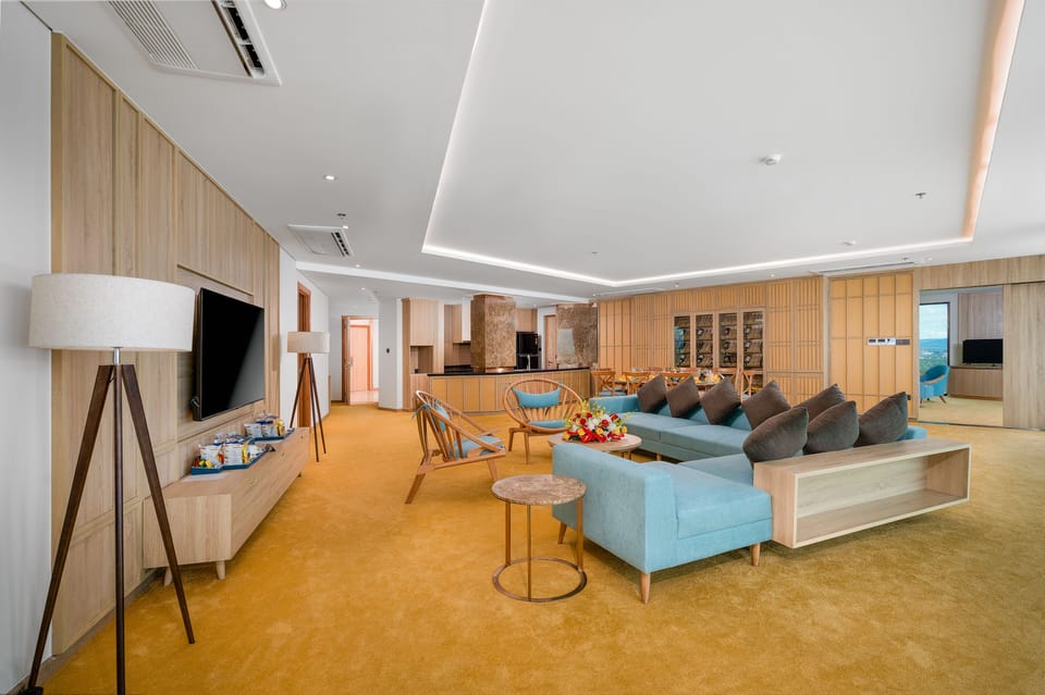 Presidential Suite | Living area | 49-inch Smart TV with cable channels, TV