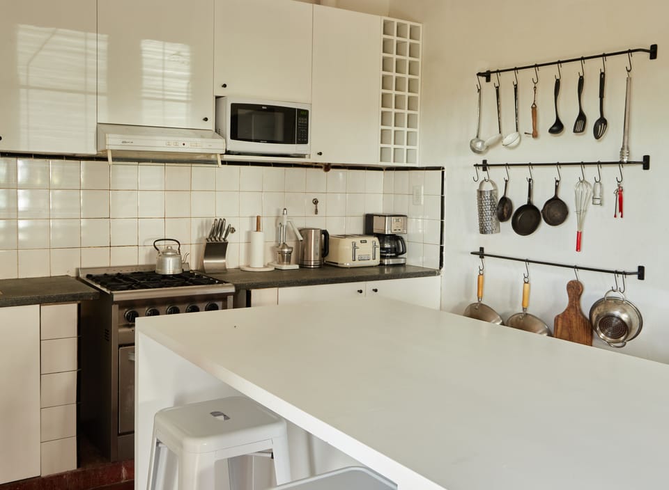 Cottage | Private kitchen | Full-size fridge, microwave, oven, coffee/tea maker