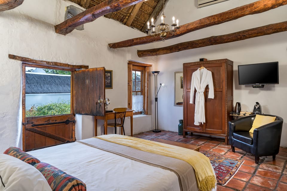 Family Room | Premium bedding, individually decorated, individually furnished, desk