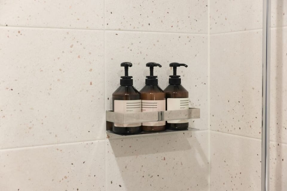 Spa | Bathroom | Shower, hair dryer, slippers, towels