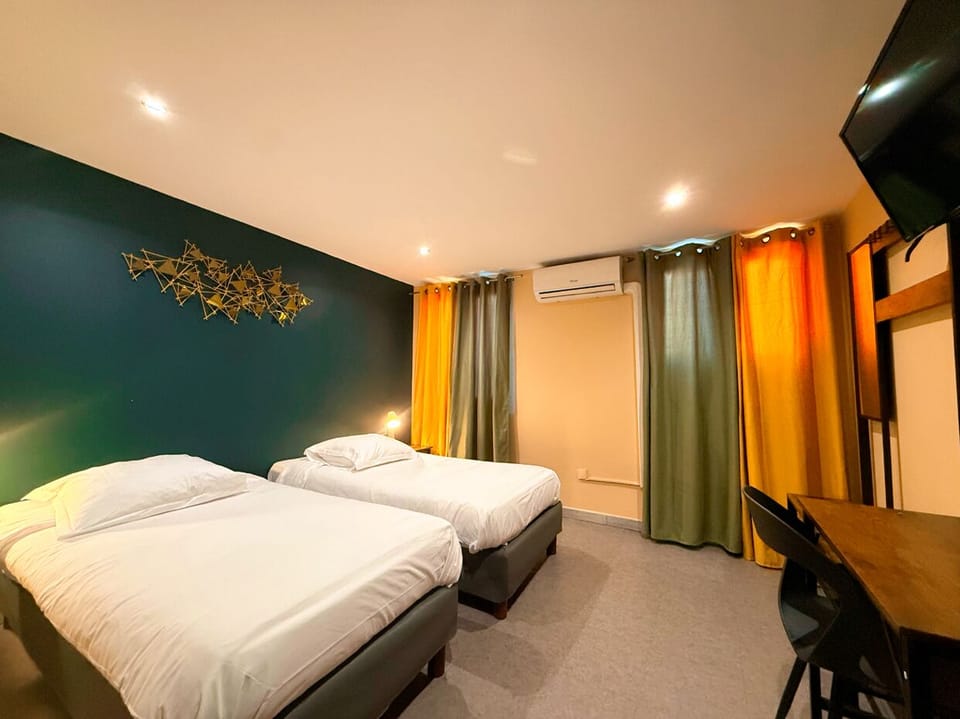 Standard Twin Room | Desk, laptop workspace, blackout drapes, iron/ironing board (on request)