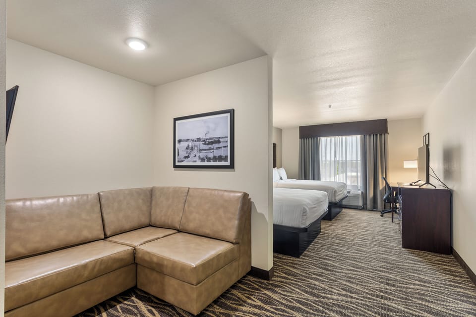 Premium bedding, pillowtop beds, desk, laptop workspace