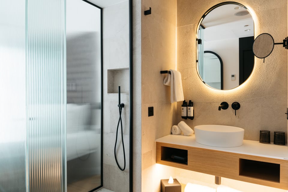 Premium bedding, down comforters, minibar, in-room safe
