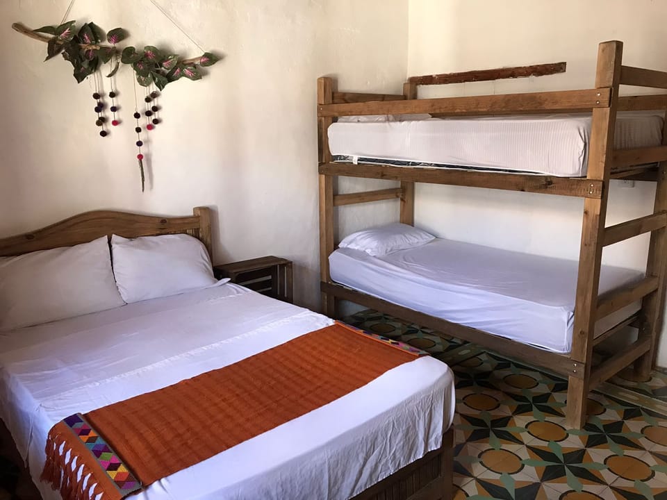Economy Quadruple Room, 1 Bedroom | WiFi (free), bed sheets