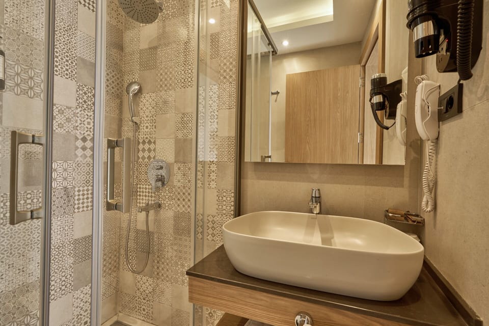 Premium bedding, minibar, in-room safe, laptop workspace