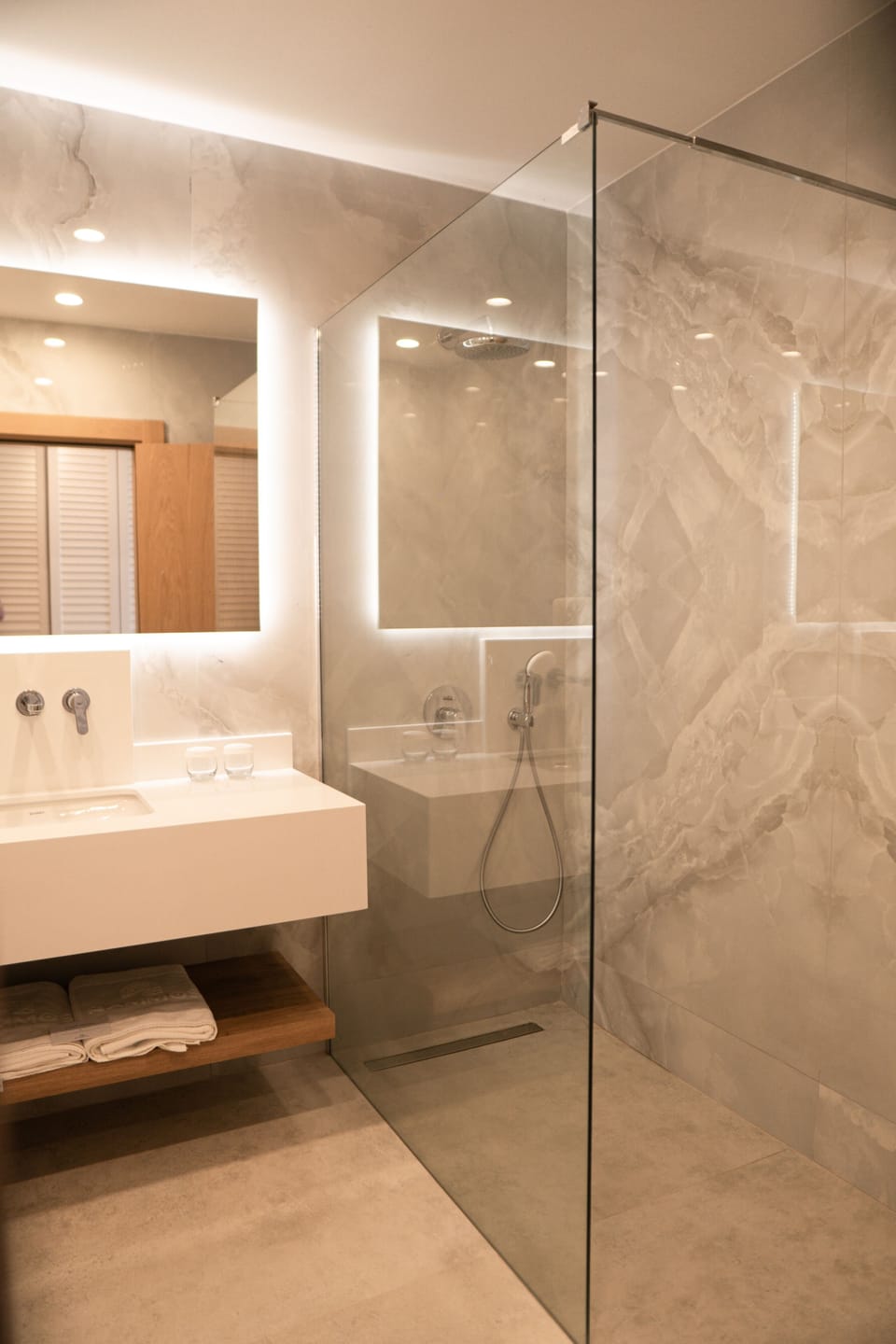 Shower, eco-friendly toiletries, hair dryer, slippers