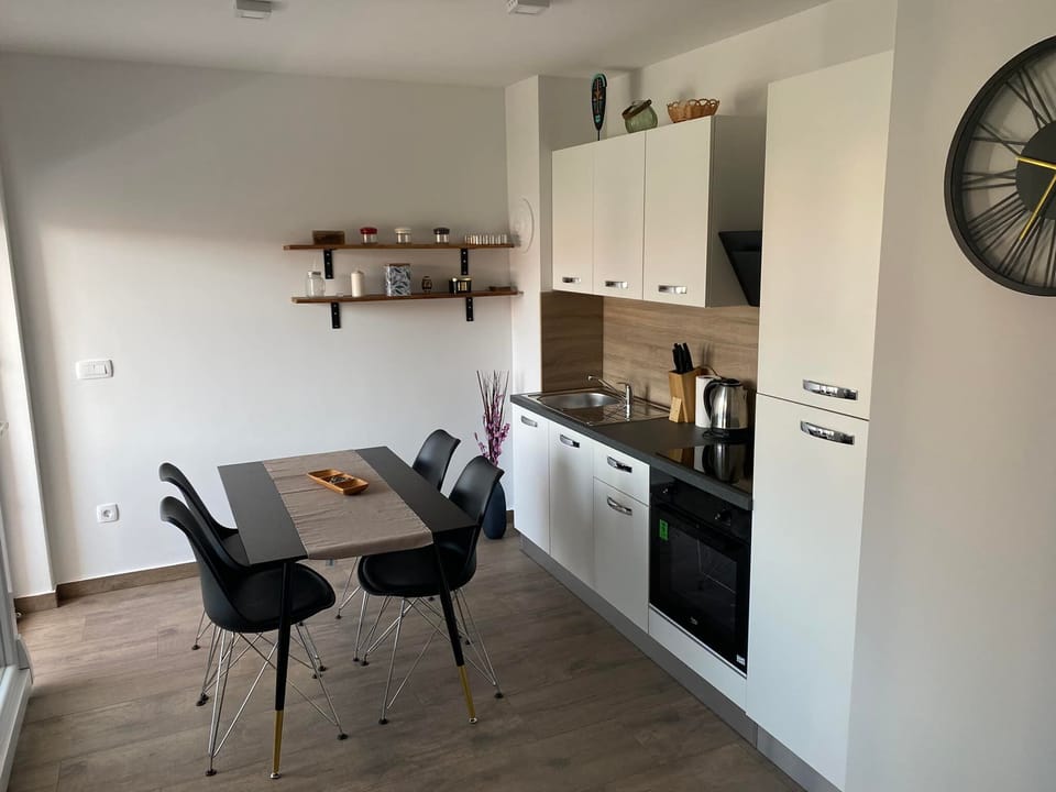 Apartment (One Bedroom Apartment with Balcony) | Private kitchen | Fridge