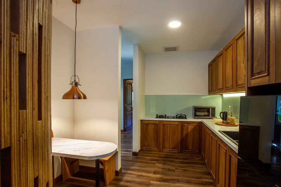 Family Apartment, 2 Bedrooms, Resort View | Private kitchen | Electric kettle