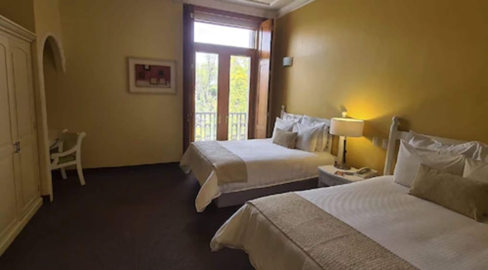 Superior Suite, 2 Queen Beds, City View | In-room safe, desk, blackout drapes, soundproofing