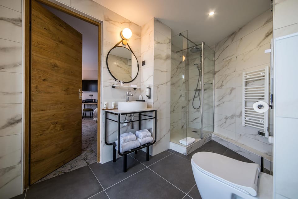 Eco-friendly toiletries, hair dryer, towels