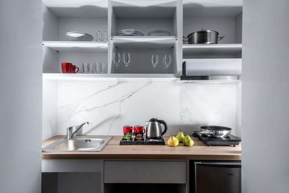 Fridge, microwave, coffee/tea maker, toaster