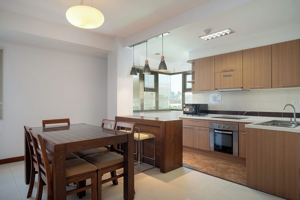 Four Bedroom Duplex Family Residence | Private kitchen | Full-size fridge, coffee/tea maker, electric kettle
