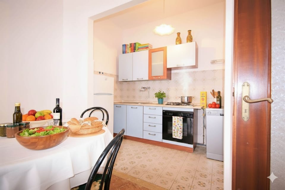 Apartment | Private kitchen | Full-size fridge, oven, stovetop, dishwasher