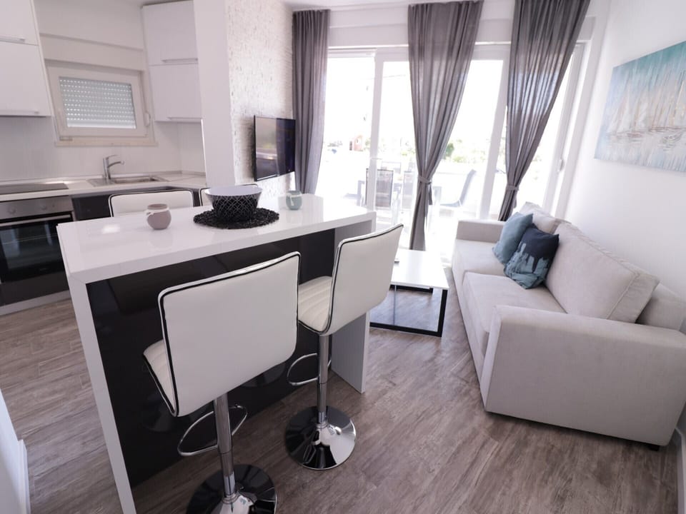 Comfort Apartment, 2 Bedrooms, Terrace | Living area | 45-inch flat-screen TV with satellite channels, TV