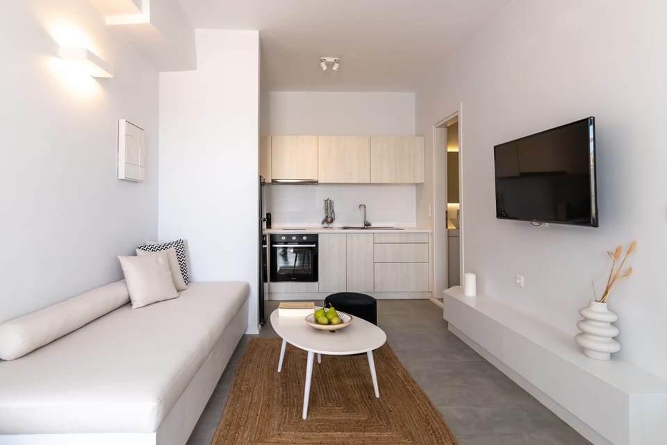 Junior Suite | Living area | 40-inch Smart TV with digital channels, Netflix, streaming services