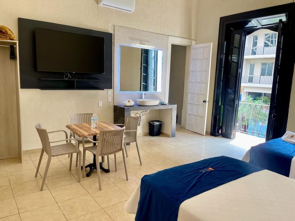 Room, 2 Double Beds | Down comforters, individually furnished, bed sheets