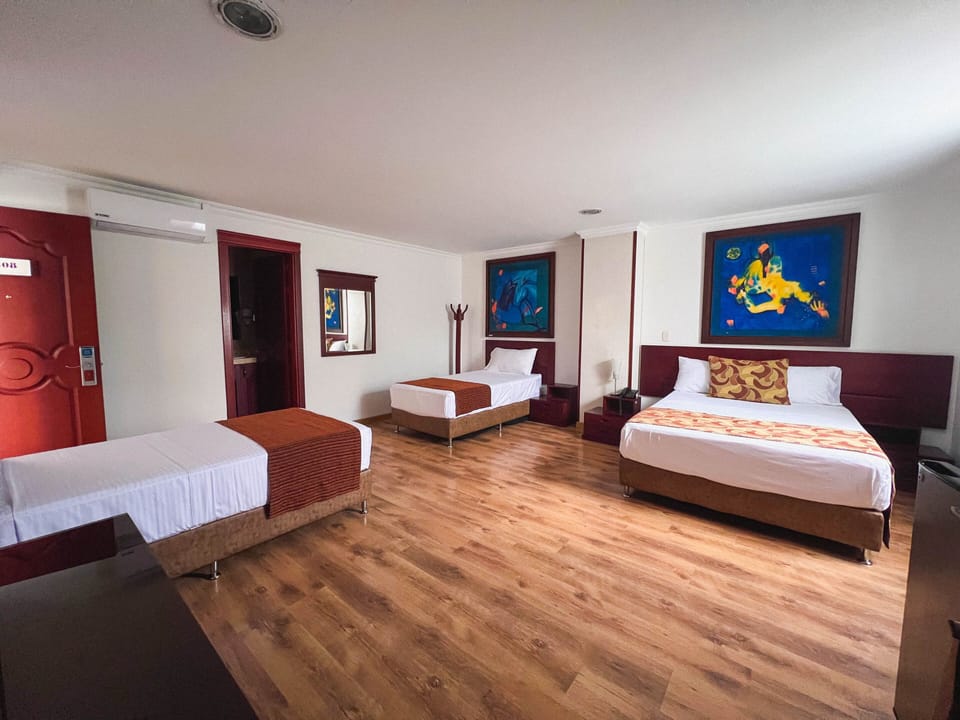 Standard Quadruple Room | In-room safe, iron/ironing board, free WiFi, bed sheets