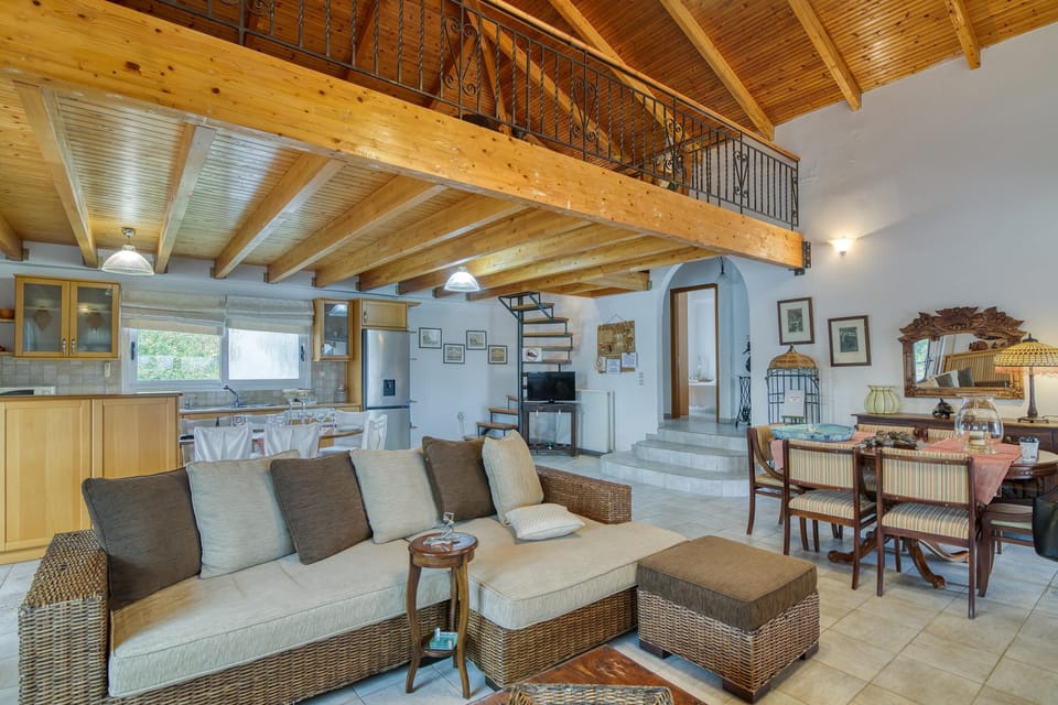 Family Villa, Multiple Bedrooms (Villa John Dimeon Kato Achaia With) | Living area | 21-inch TV with cable channels, fireplace