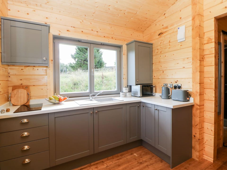 Fridge, electric kettle, toaster, cookware/dishes/utensils