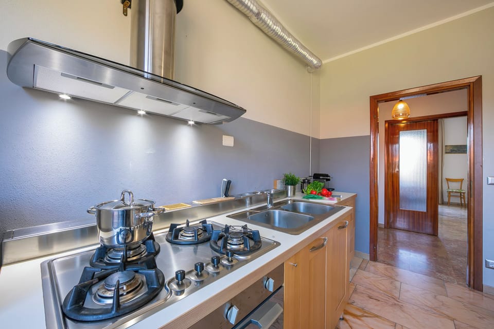 Standard Apartment, Multiple Bedrooms, 2 Bathrooms (Residenza Il Parco Family Retreat) | Private kitchen | Fridge, microwave, oven, stovetop