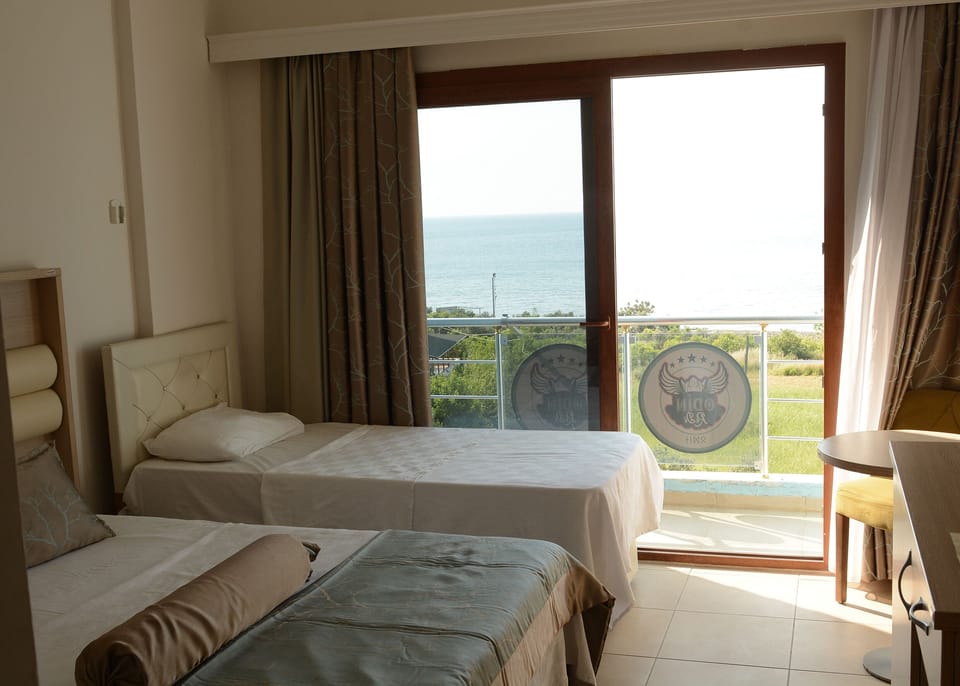 Standard Triple Room, 1 Bedroom, Smoking, Beach View | Free WiFi
