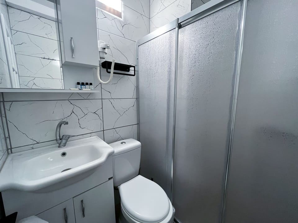 Shower, towels, soap, shampoo