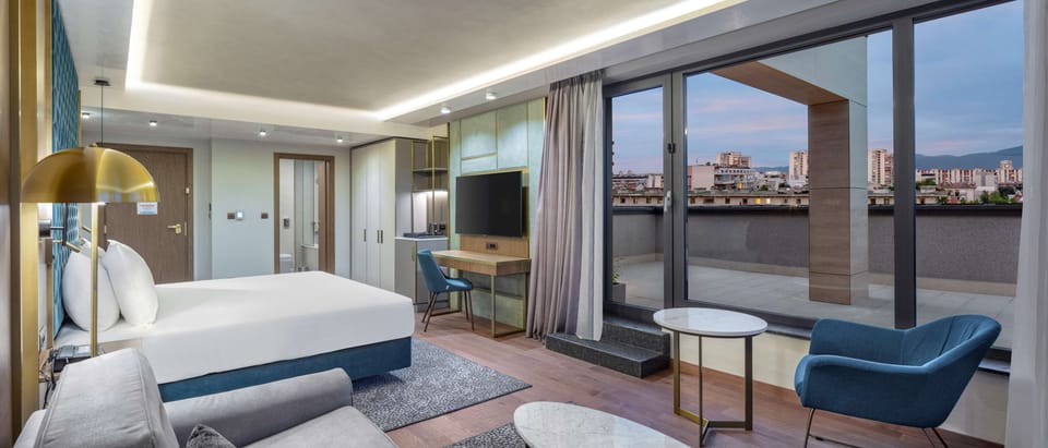 Junior Suite, 1 King Bed | Premium bedding, memory foam beds, minibar, in-room safe
