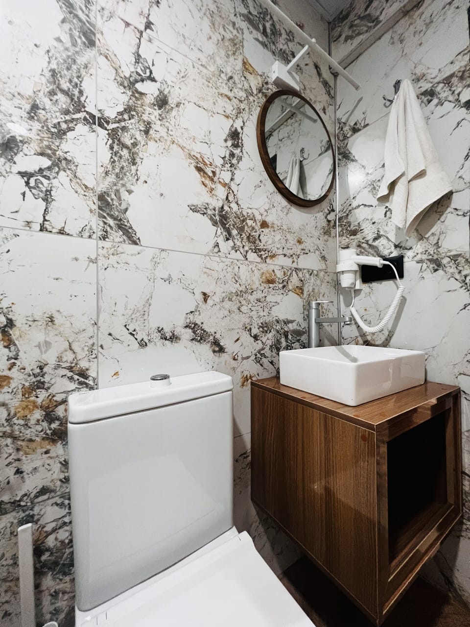 Economy Room (private bathroom outside the room) | Bathroom | Shower, hydromassage showerhead, hair dryer, towels