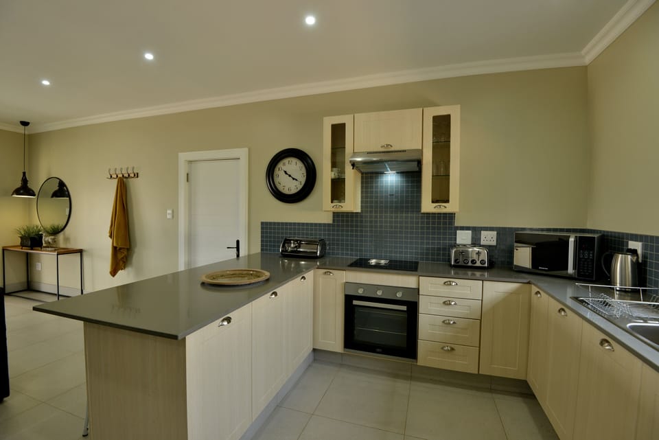 Deluxe House, 2 Bedrooms | Private kitchen | Coffee/tea maker, mini-fridge, electric kettle