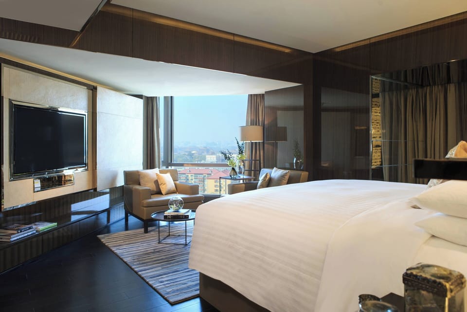Premium bedding, down comforters, minibar, in-room safe