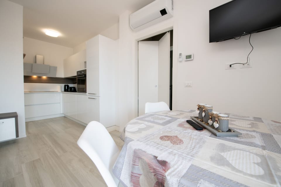 Exclusive Apartment | Living area | 90-inch Smart TV with digital channels, TV