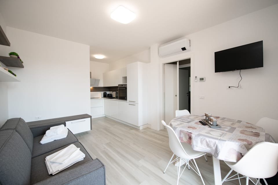 Exclusive Apartment | Living area | 90-inch Smart TV with digital channels, TV