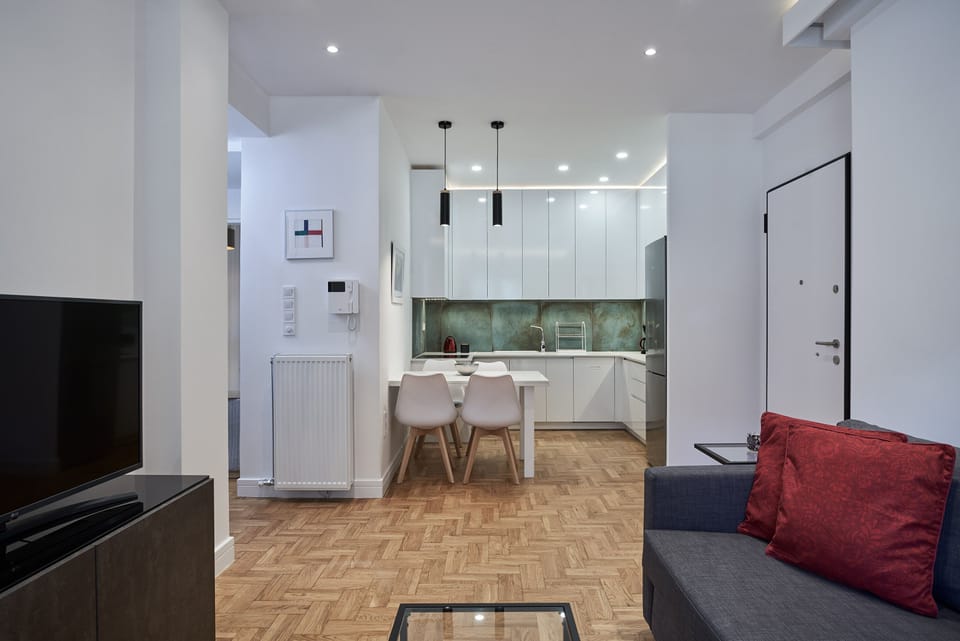 Comfort Apartment | Living area | Flat-screen TV