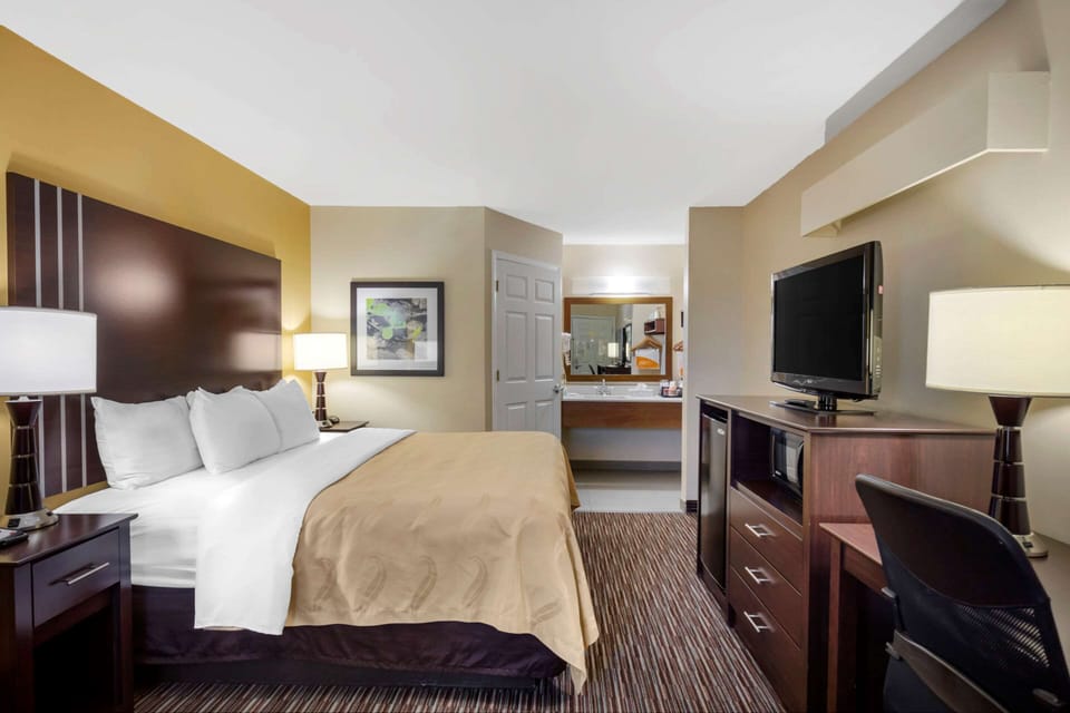 Pillowtop beds, desk, laptop workspace, blackout drapes