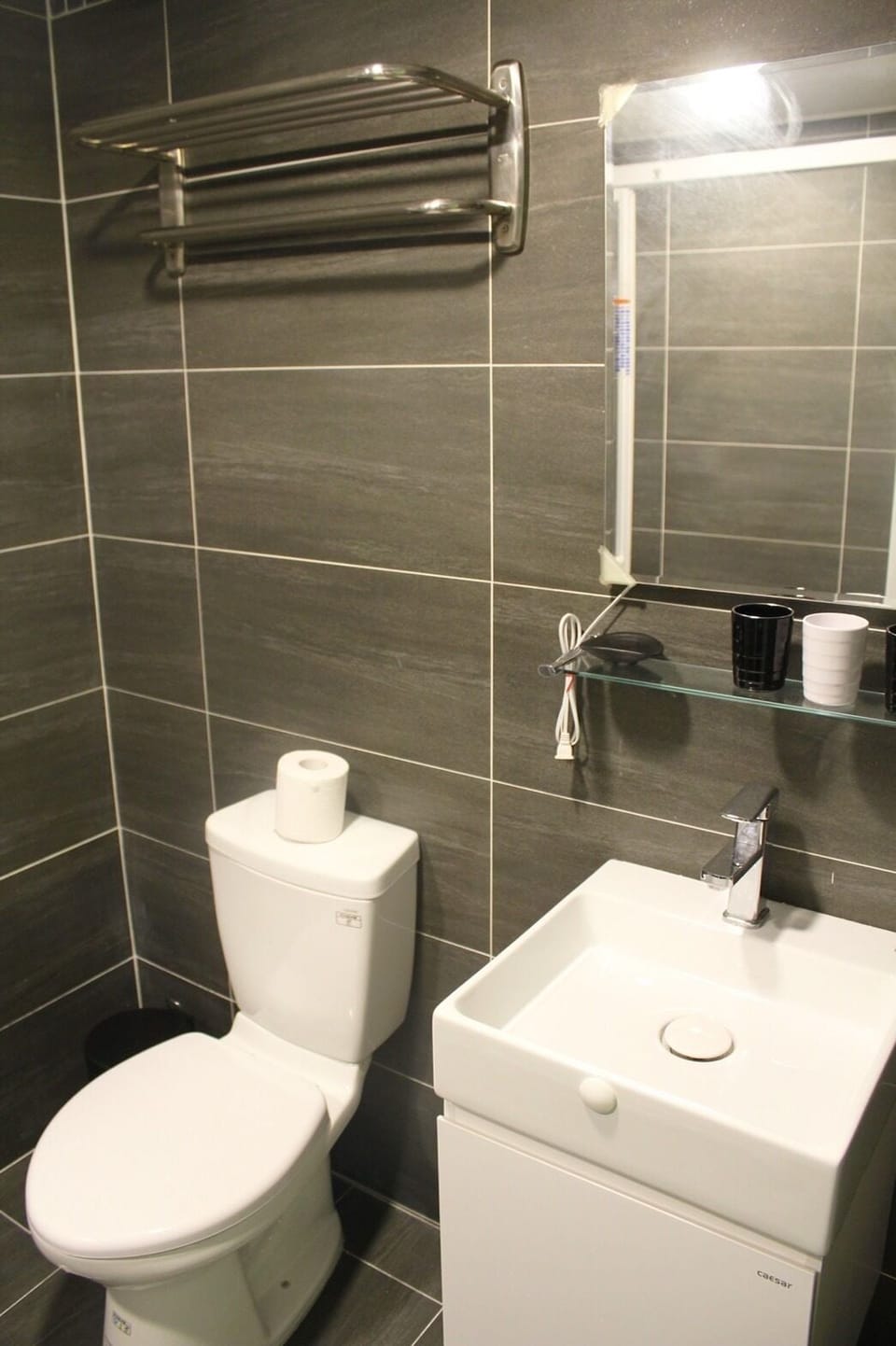 Shower, rainfall showerhead, hair dryer, towels