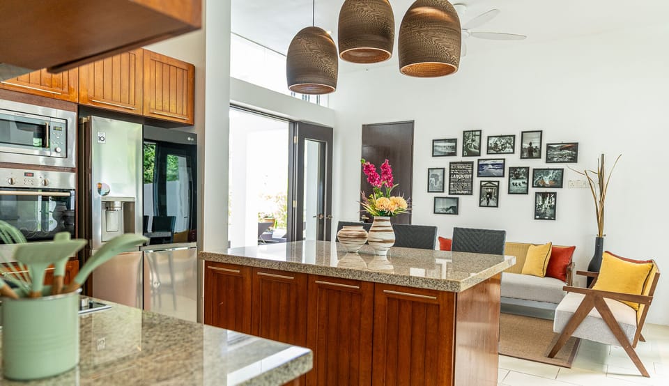 Luxury Villa | Private kitchen | Full-size fridge, microwave, oven, stovetop