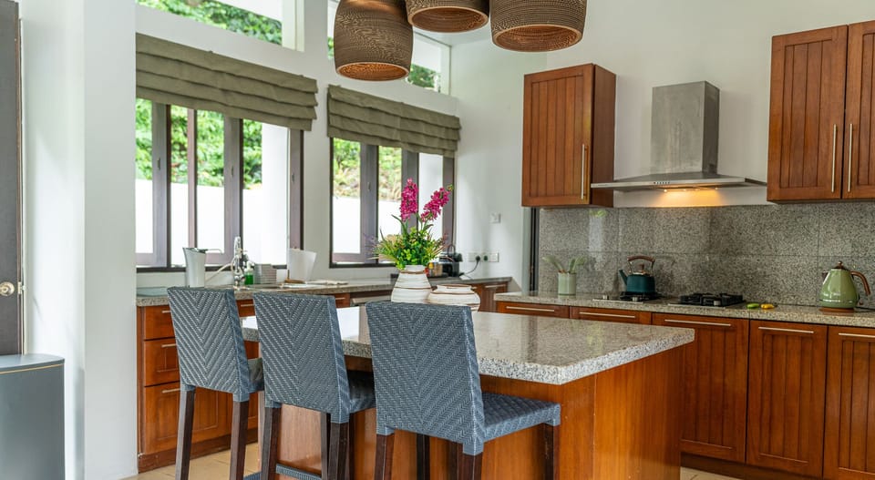 Luxury Villa | Private kitchen | Full-size fridge, microwave, oven, stovetop