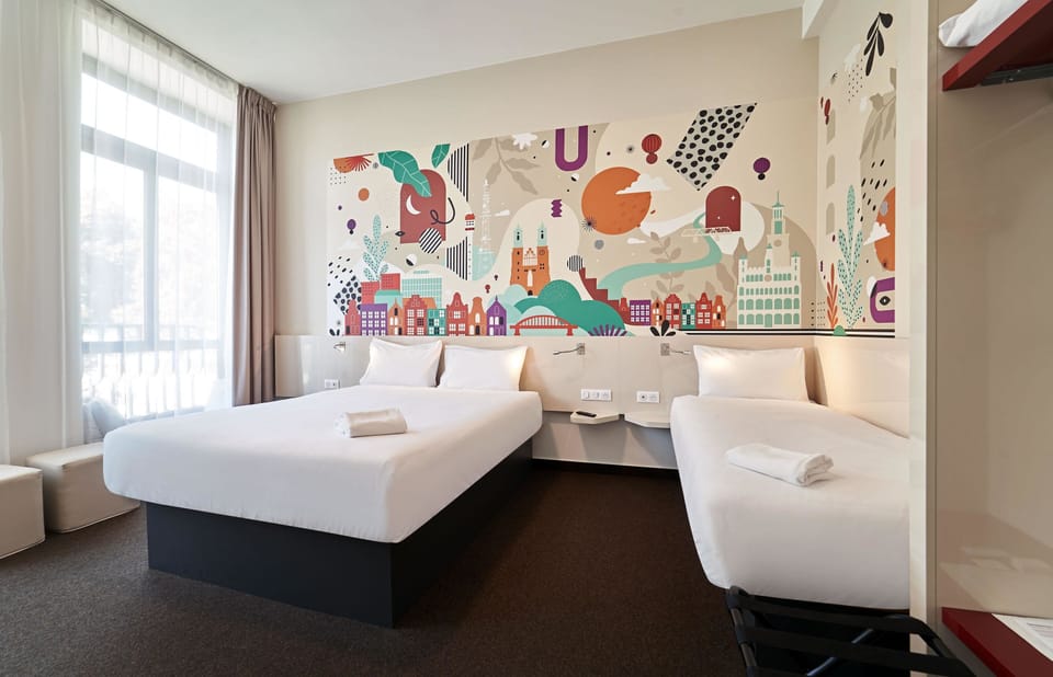 Family Triple Room, City View | Desk, laptop workspace, soundproofing, WiFi (free)