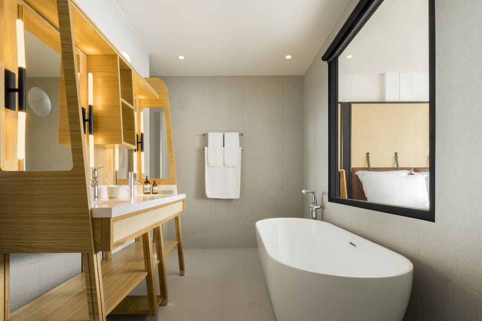 Eco-friendly toiletries, hair dryer, bathrobes, towels