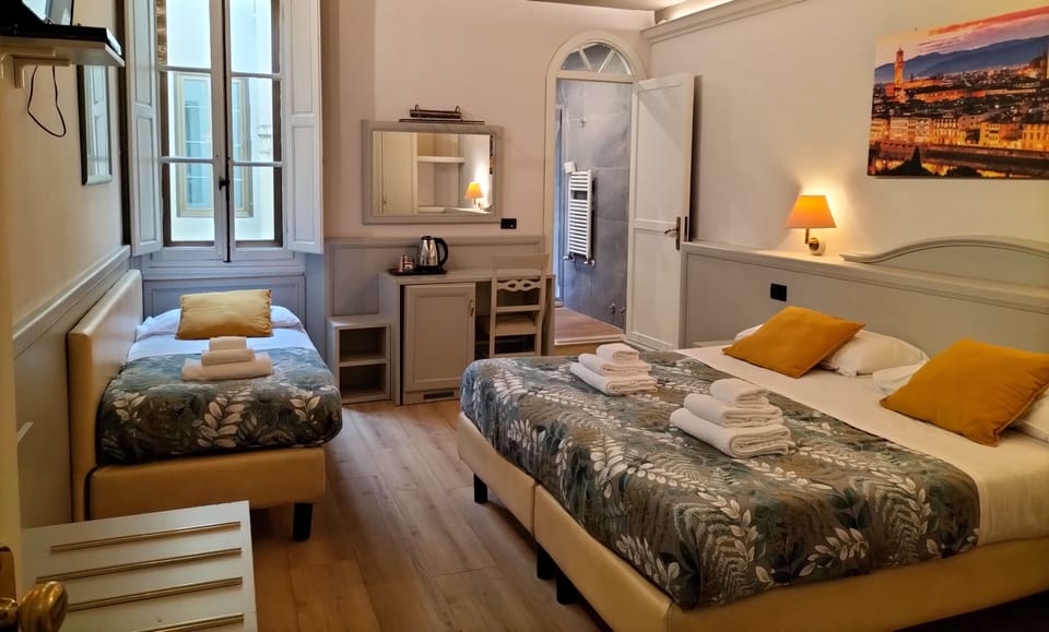 Triple Room | Minibar, in-room safe, desk, soundproofing