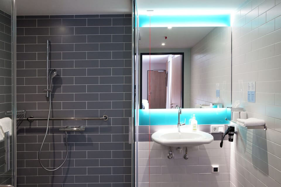 Shower, eco-friendly toiletries, hair dryer, heated floors